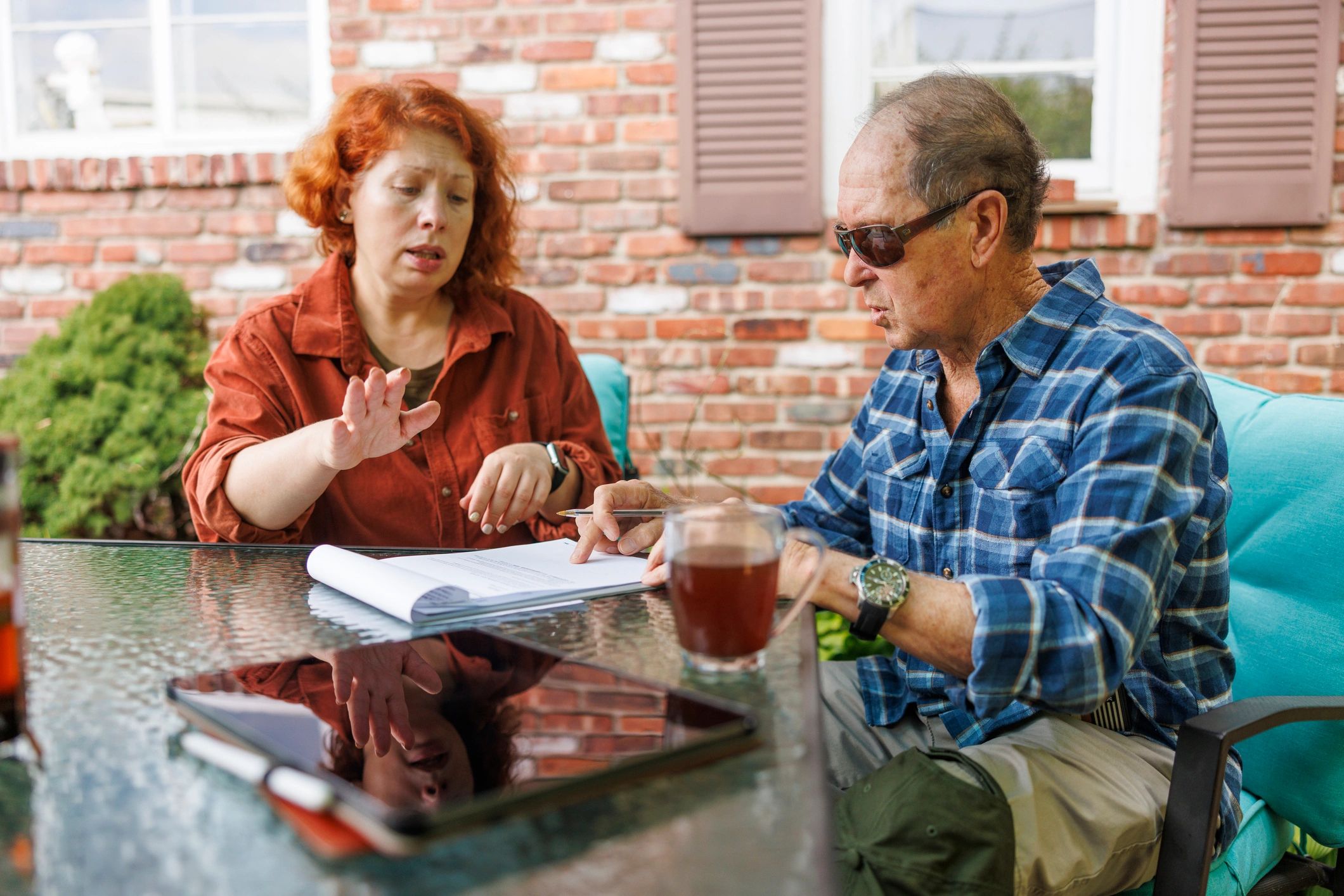 Financial planning consultation reviewing documents