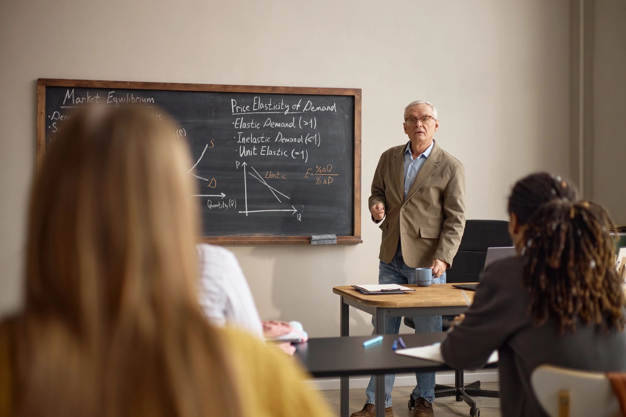 Instructor leading an economics and financial education class
